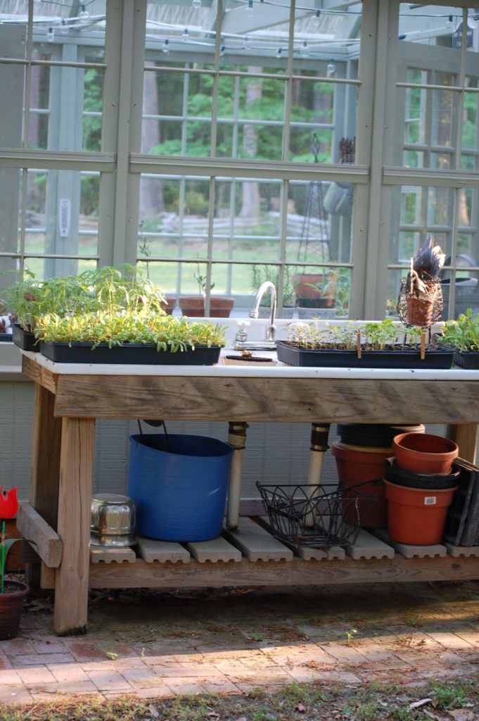upcycled greenhouse - the potting bench