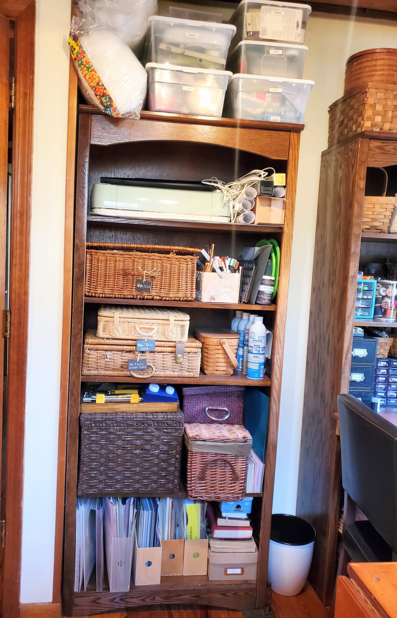 Craft bookshelf in sewing room