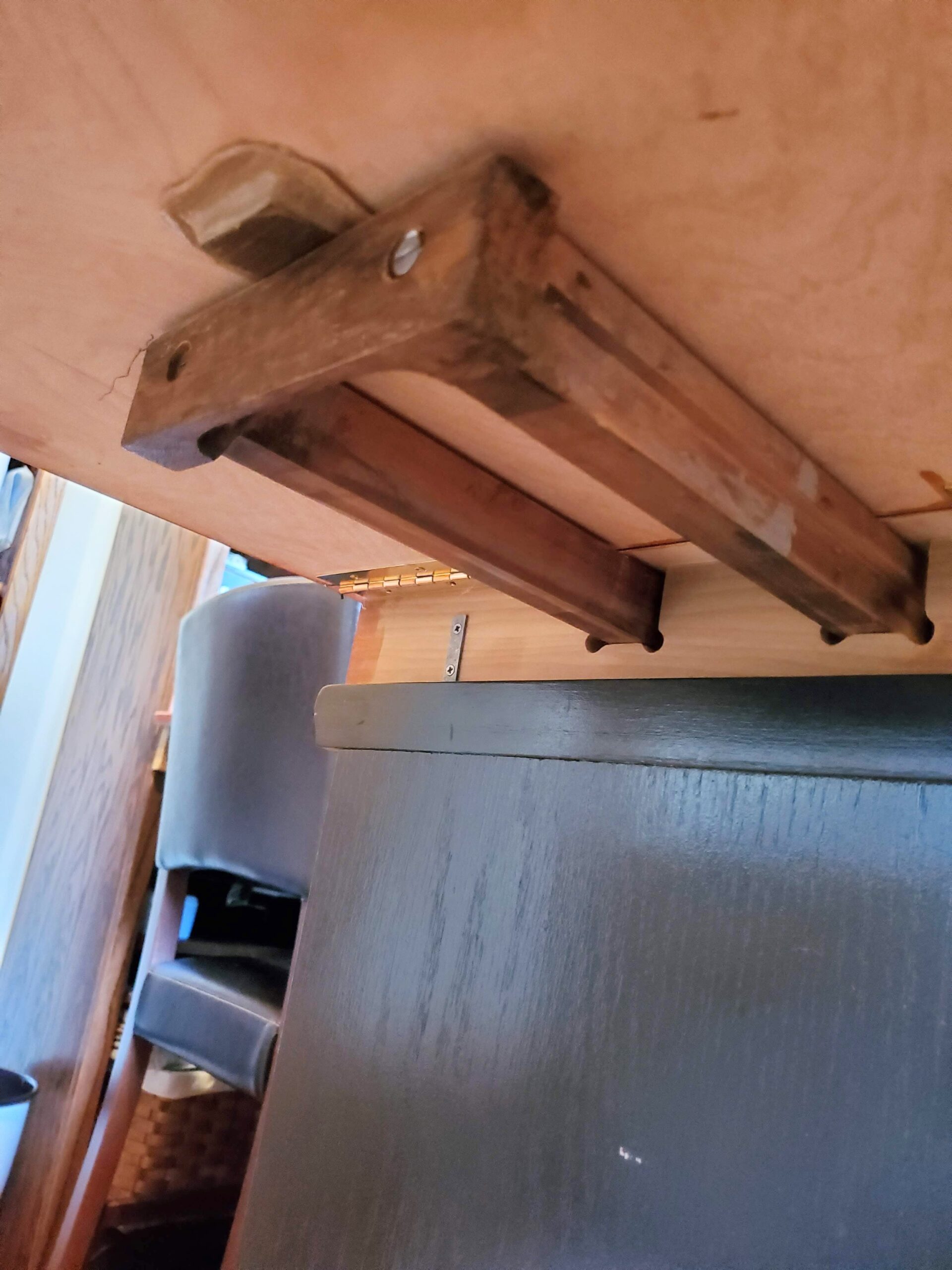 Upcycled table hardware for craft and sewing studio counter